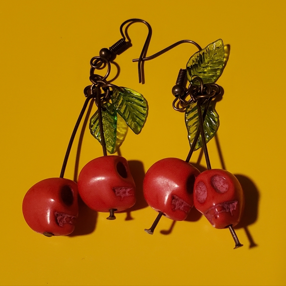 Charming Red Cherry Skull Earrings with Green Leaf Accents